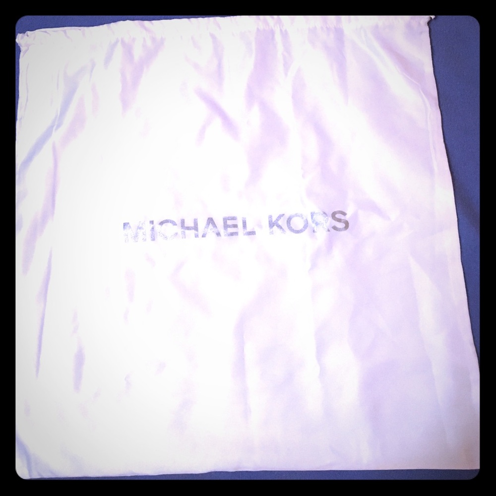 Two Michael Kors purse duster bags. 1 Lrg 1 Small